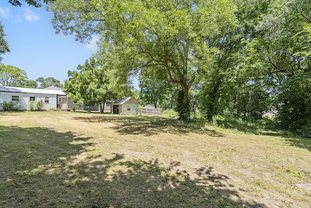 526 S Mccanse St, Mount Vernon, MO 65712 - view of grassy yard with an outdoor structure