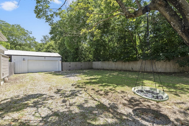 526 S Mccanse St, Mount Vernon, MO 65712 - fenced backyard featuring a garage and an outbuilding