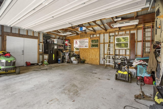 526 S Mccanse St, Mount Vernon, MO 65712 - garage with a garage door opener