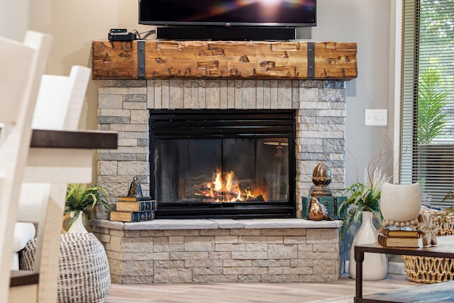 348 Sunset Cv Unit 413, Branson, MO 65616 - detailed view of a fireplace and wood finished floors