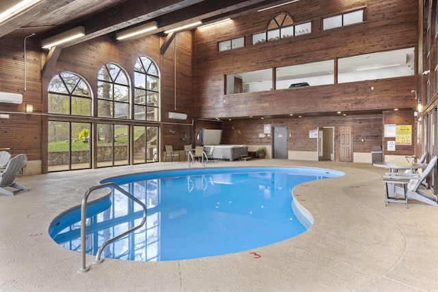 348 Sunset Cv Unit 413, Branson, MO 65616 - indoor community pool featuring a wall mounted air conditioner