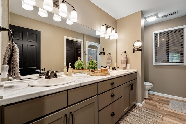 348 Sunset Cv Unit 413, Branson, MO 65616 - full bath with double vanity and wood finished floors