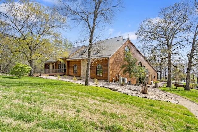 348 Sunset Cv Unit 413, Branson, MO 65616 - back of house featuring a yard and a deck