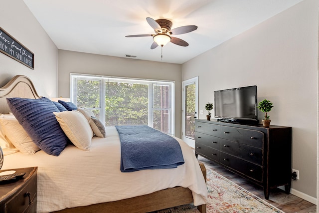348 Sunset Cv Unit 413, Branson, MO 65616 - bedroom featuring wood finished floors, access to exterior, and a ceiling fan
