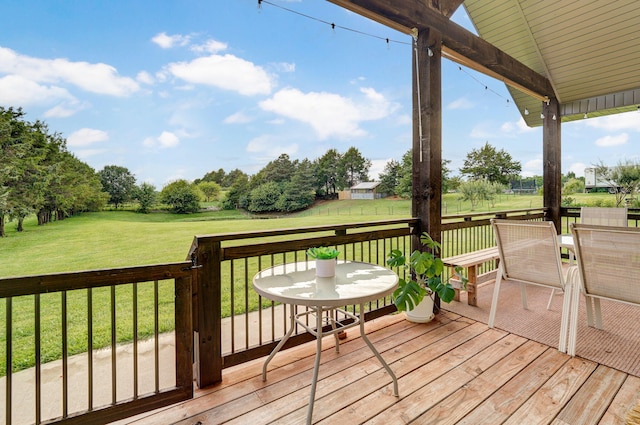 4113 S Farm Rd Unit 223, Rogersville, MO 65742 - wooden deck with a yard, outdoor dining space, and view of wooded area