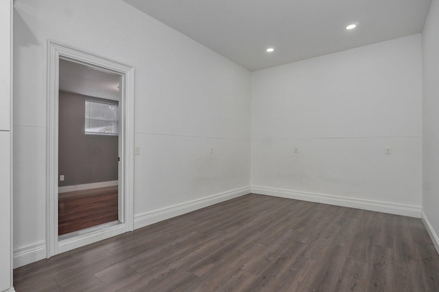 4113 S Farm Rd Unit 223, Rogersville, MO 65742 - unfurnished room featuring dark wood-style flooring and recessed lighting
