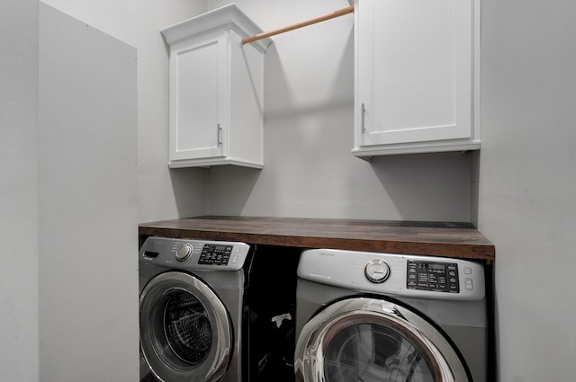 4113 S Farm Rd Unit 223, Rogersville, MO 65742 - washroom featuring separate washer and dryer and cabinet space
