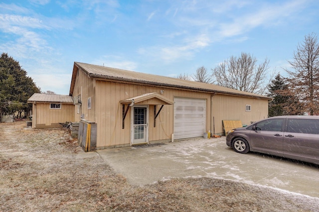 4113 S Farm Rd Unit 223, Rogersville, MO 65742 - garage with concrete driveway