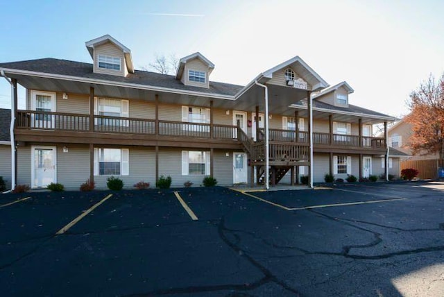 17 Fall Creek Trl Unit 4, Branson, MO 65616 - view of building exterior featuring uncovered parking and stairs