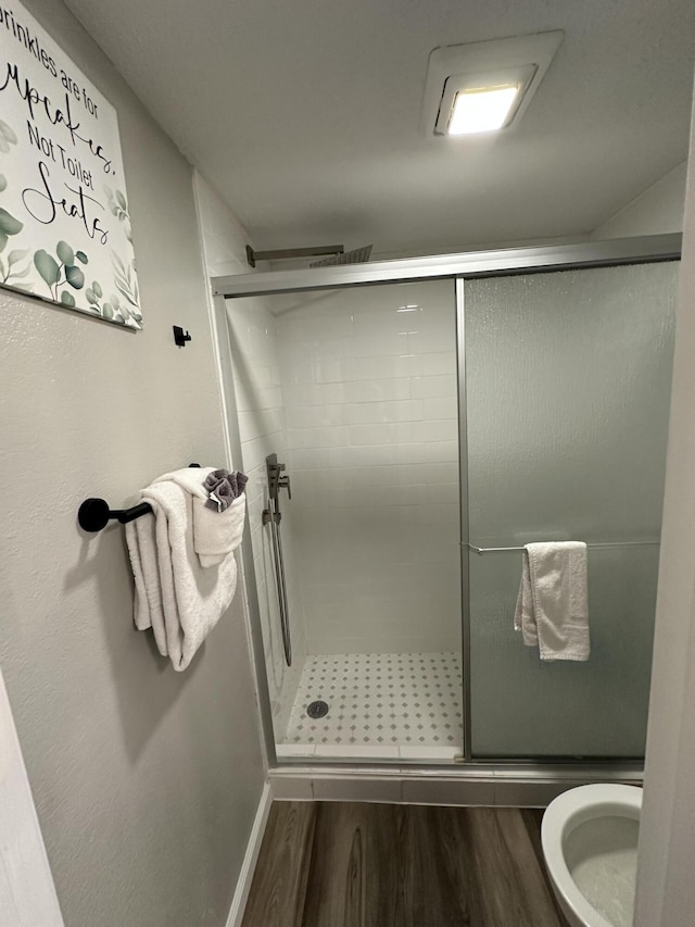 17 Fall Creek Trl Unit 4, Branson, MO 65616 - full bathroom featuring wood finished floors and a stall shower