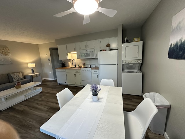 17 Fall Creek Trl Unit 4, Branson, MO 65616 - dining area with stacked washing machine and dryer, dark wood-style floors, and ceiling fan