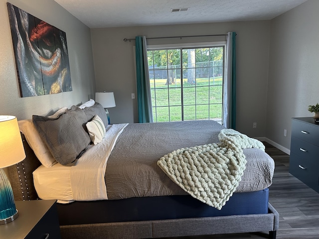 17 Fall Creek Trl Unit 4, Branson, MO 65616 - bedroom featuring dark wood-type flooring and baseboards