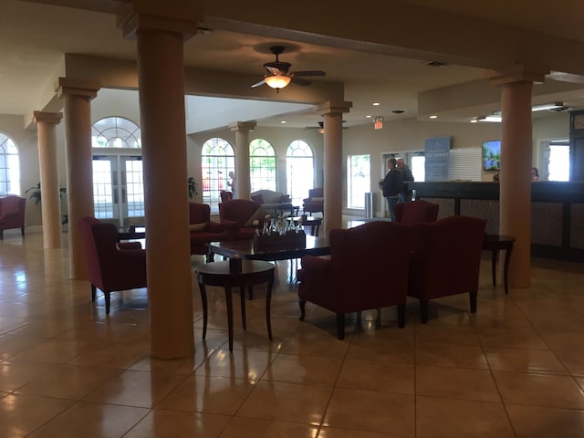 17 Fall Creek Trl Unit 4, Branson, MO 65616 - dining space featuring decorative columns, ceiling fan, light tile patterned flooring, healthy amount of natural light, and recessed lighting