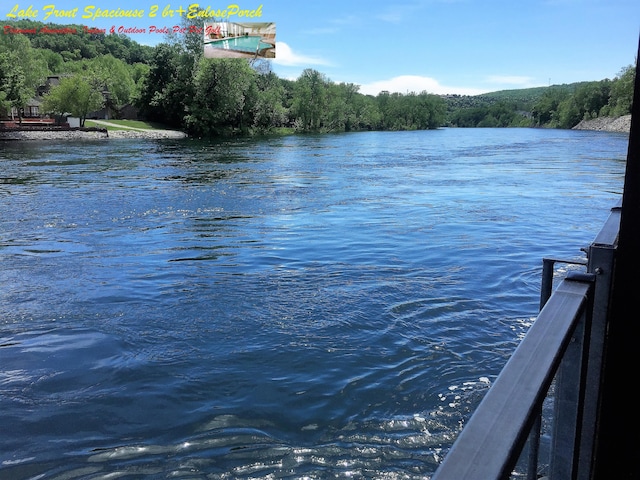 17 Fall Creek Trl Unit 4, Branson, MO 65616 - water view with a forest