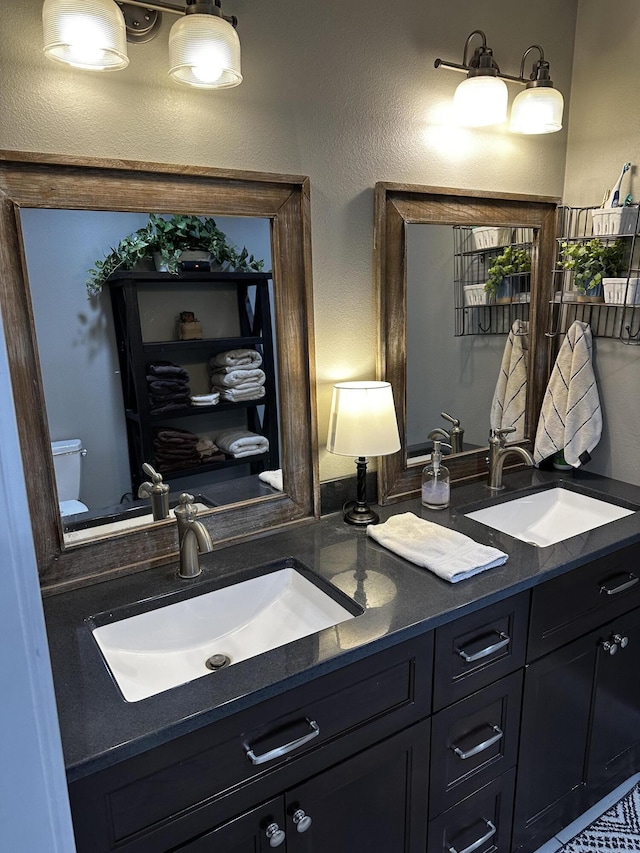 1179 N Pine St, Marshfield, MO 65706 - bathroom with double vanity and toilet