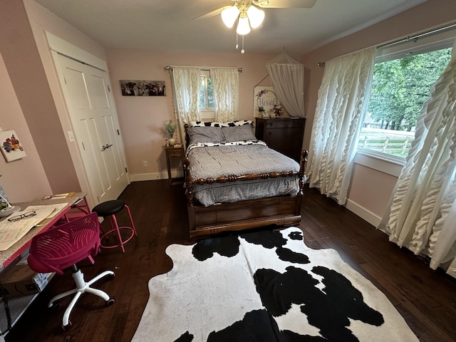 1179 N Pine St, Marshfield, MO 65706 - bedroom with wood finished floors and a ceiling fan