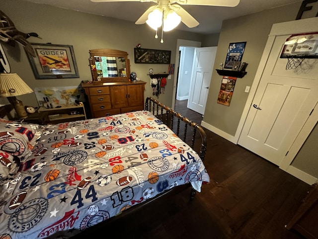 1179 N Pine St, Marshfield, MO 65706 - bedroom with dark wood-type flooring and ceiling fan
