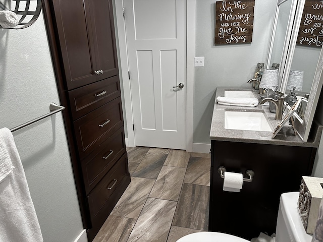 1179 N Pine St, Marshfield, MO 65706 - bathroom with double vanity and baseboards