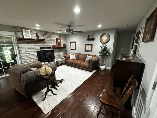 1179 N Pine St, Marshfield, MO 65706 - living room with a ceiling fan, a wood stove, hardwood / wood-style floors, and recessed lighting
