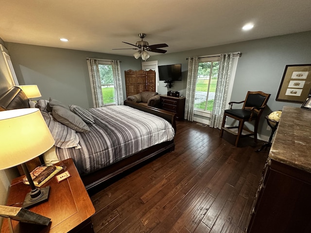 1179 N Pine St, Marshfield, MO 65706 - bedroom with multiple windows, dark wood-type flooring, recessed lighting, and ceiling fan