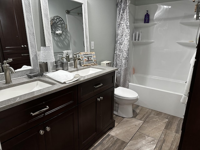 1179 N Pine St, Marshfield, MO 65706 - bathroom featuring double vanity, shower / bath combo, and wood finished floors