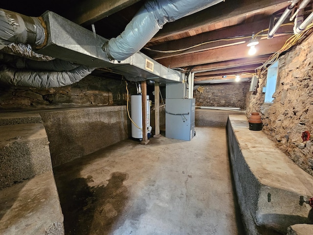 609 S College St, Neosho, MO 64850 - below grade area with water heater, heating unit, and electric panel