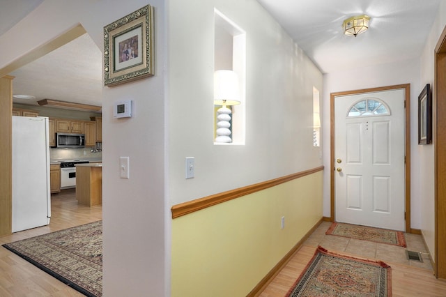 1060 Berkley, Marshfield, MO 65706 - foyer featuring light wood finished floors and baseboards