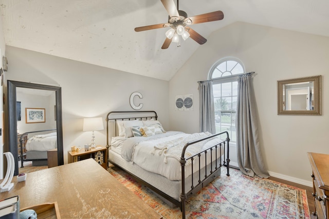 1251 S Rosemoor Dr, Nixa, MO 65714 - bedroom with wood finished floors, vaulted ceiling, and ceiling fan