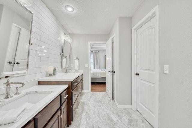 1251 S Rosemoor Dr, Nixa, MO 65714 - full bathroom featuring vanity and ensuite bathroom