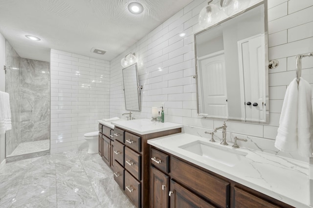 1251 S Rosemoor Dr, Nixa, MO 65714 - full bath with tile walls, vanity, walk in shower, marble finish floors, and recessed lighting