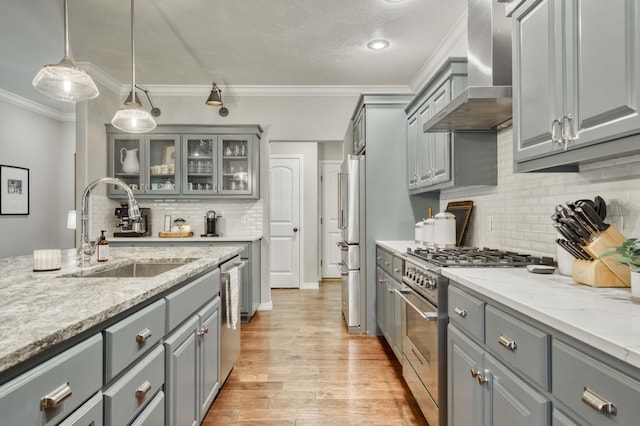 1251 S Rosemoor Dr, Nixa, MO 65714 - kitchen featuring stainless steel appliances, wall chimney exhaust hood, gray cabinets, and crown molding