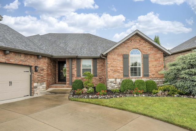 1251 S Rosemoor Dr, Nixa, MO 65714 - single story home with roof with shingles, driveway, brick siding, a front lawn, and a garage