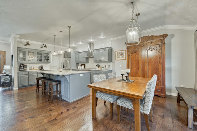 1251 S Rosemoor Dr, Nixa, MO 65714 - dining room with dark wood-type flooring, ornamental molding, and recessed lighting