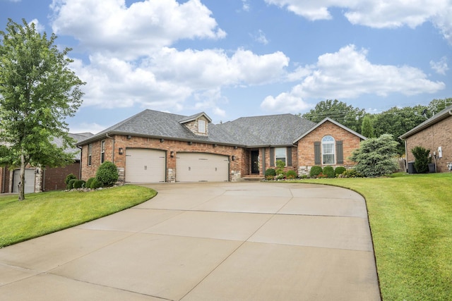 1251 S Rosemoor Dr, Nixa, MO 65714 - view of front of house featuring brick siding, an attached garage, a front yard, and concrete driveway