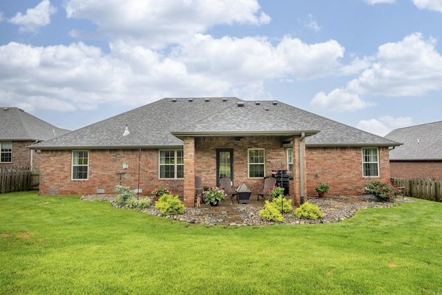 1251 S Rosemoor Dr, Nixa, MO 65714 - back of property with brick siding, a fenced backyard, and a shingled roof