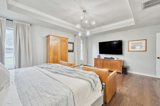 1251 S Rosemoor Dr, Nixa, MO 65714 - bedroom featuring a raised ceiling, dark wood-type flooring, crown molding, and a chandelier