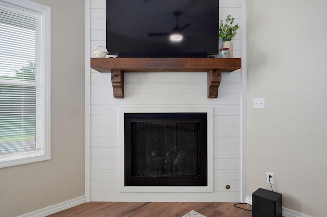 816 S Rockburn Ct, Nixa, MO 65714 - detailed view of a fireplace and wood finished floors