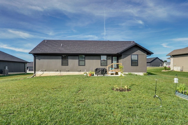816 S Rockburn Ct, Nixa, MO 65714 - back of property with a shingled roof, a patio, and a yard