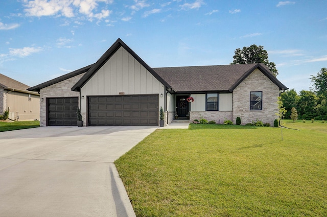 816 S Rockburn Ct, Nixa, MO 65714 - view of front facade with a garage, board and batten siding, a front lawn, stone siding, and concrete driveway