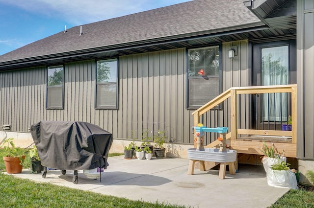 816 S Rockburn Ct, Nixa, MO 65714 - rear view of house featuring roof with shingles and a patio