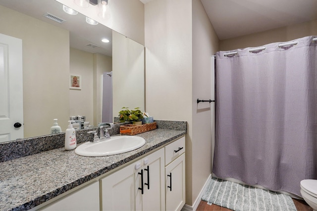 816 S Rockburn Ct, Nixa, MO 65714 - bathroom with vanity, a shower with shower curtain, and wood finished floors