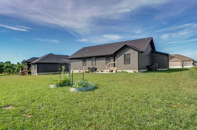 816 S Rockburn Ct, Nixa, MO 65714 - rear view of house featuring a yard and roof with shingles