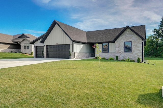 816 S Rockburn Ct, Nixa, MO 65714 - view of front of home with board and batten siding, an attached garage, a front lawn, stone siding, and a shingled roof