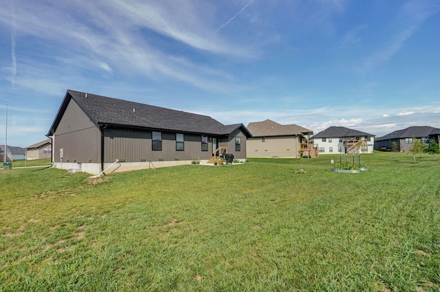 816 S Rockburn Ct, Nixa, MO 65714 - back of house featuring a yard and a residential view