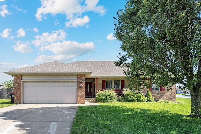 701 Lexington Cir, Clever, MO 65631 - ranch-style house featuring concrete driveway, brick siding, an attached garage, and a front lawn