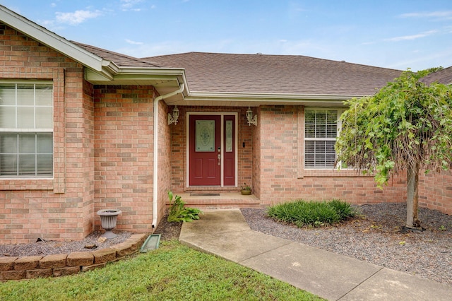 431 S Yellowwood Dr, Springfield, MO 65809 - property entrance with a shingled roof and brick siding