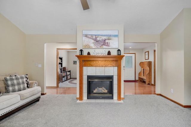 431 S Yellowwood Dr, Springfield, MO 65809 - living area featuring carpet floors, ceiling fan, and a tile fireplace