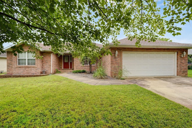 431 S Yellowwood Dr, Springfield, MO 65809 - ranch-style house featuring a garage, driveway, brick siding, and a front yard