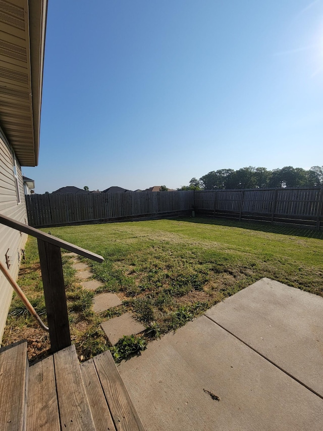 100 Hawthorn Ave, Rogersville, MO 65742 - fenced backyard featuring a patio area