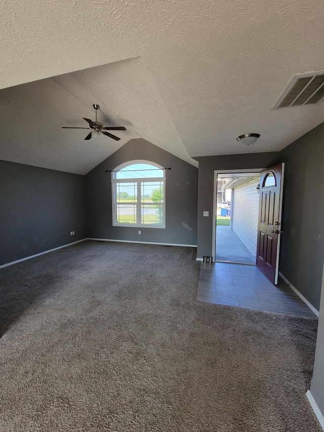 100 Hawthorn Ave, Rogersville, MO 65742 - unfurnished room with carpet floors, a ceiling fan, lofted ceiling, and a textured ceiling